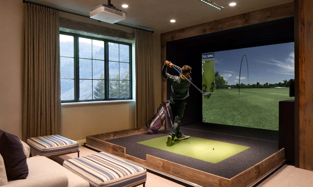 basement golf simulator room with a unique flooring design