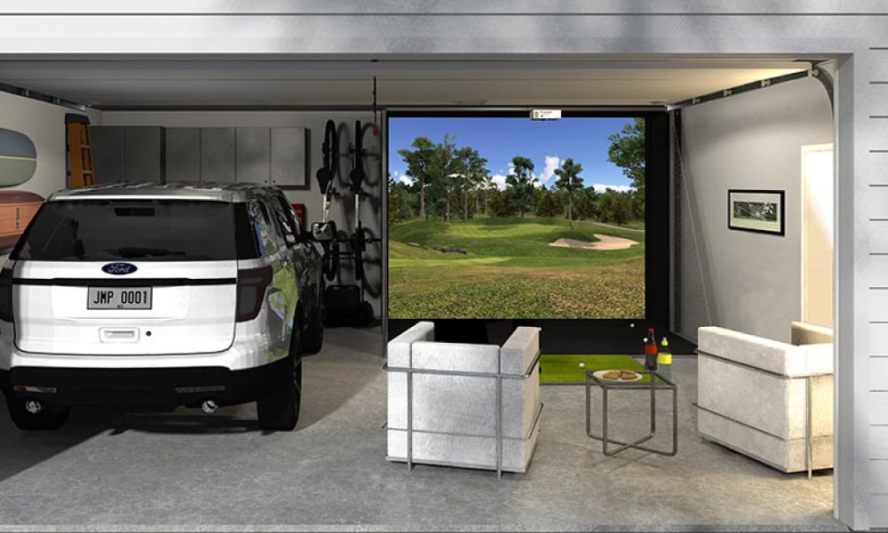 car parked beside a golf simulator setup