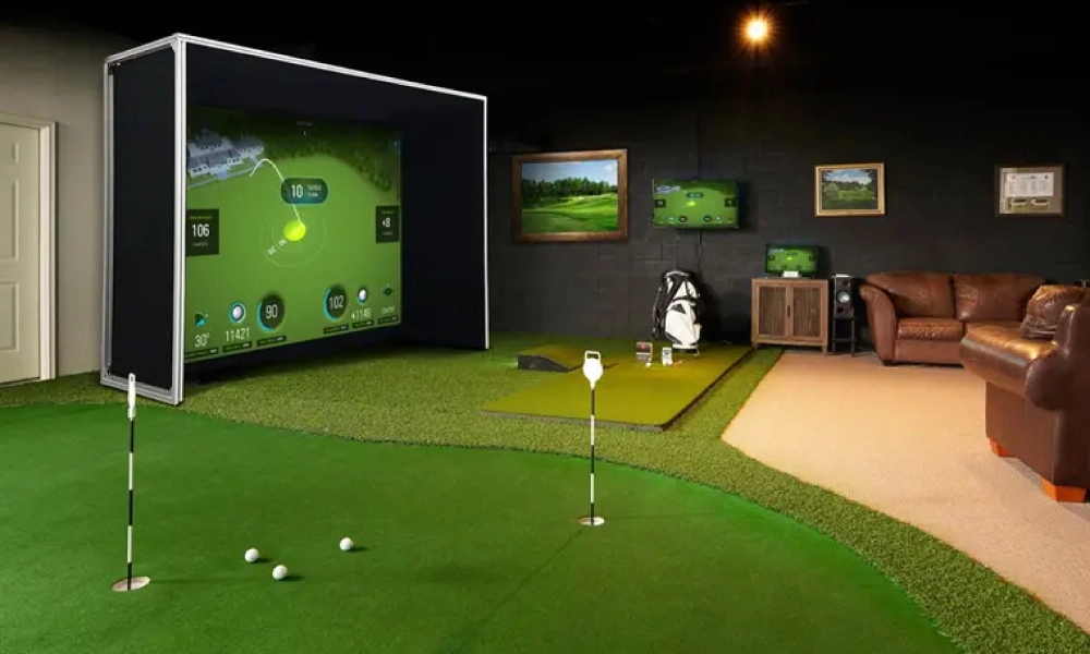golf simulator room with artificial turf that mimics the look and feel of real grass