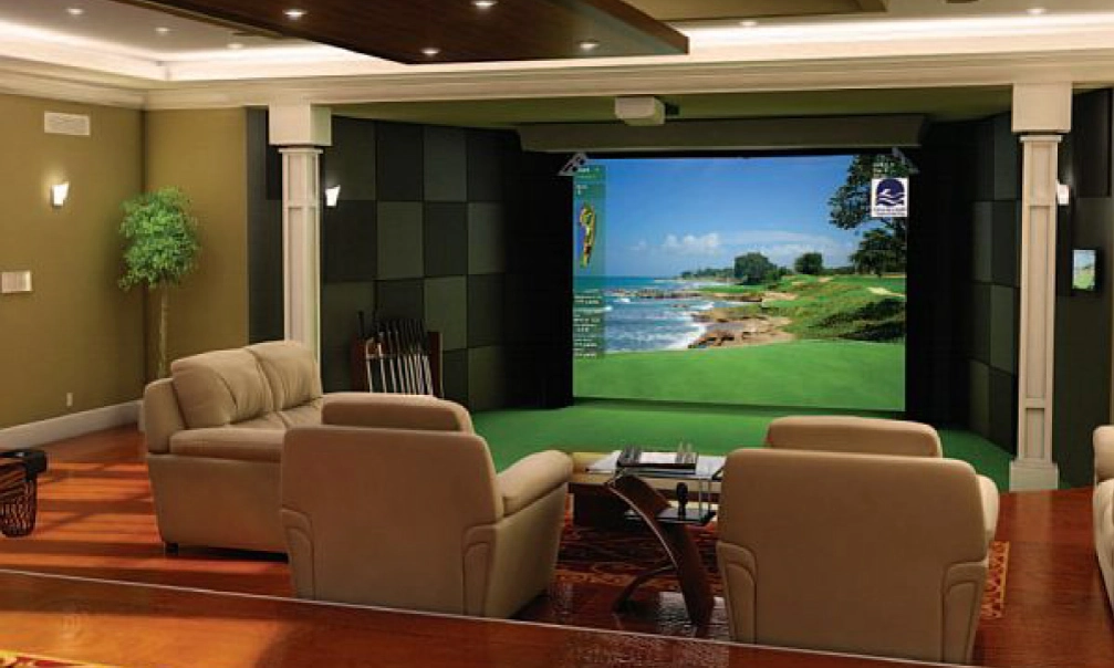 golf simulator room with comfortable seating and ambient lighting